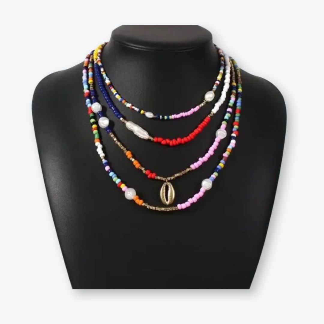 Catenine: Mehrlagige Kunstperlen-Halskette im Boho-Stil – Nuovo (secondo la descrizione) da Oberkirch LU venduto da petitefashion