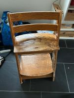 Kinderhochstuhl aus Holz.