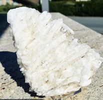 Grosse schneeweisse Quarzsonne mit etlichen Doppelender