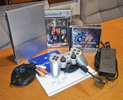 PlayStation 2 Slim + Top Games + Zubehör