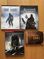 3 Lösungsbücher + 1 Artbook (Dishonored, Assassins, Anno)