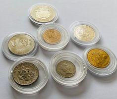 Lot mit 7 x Münzen Euro + Dollar + Francs Total 144 Gramm +