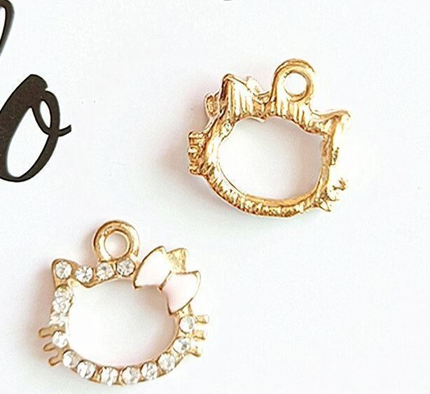 Anhänger: Hello Kitty: 2pcs pendentif doré – Neu und originalverpackt aus Lutry von kylab7 1