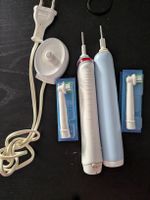 2 Braun Oral B Zahnbürsten mit 4 Aufsätzen 