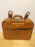 Valise vintage en cuir marron avec bretelles 