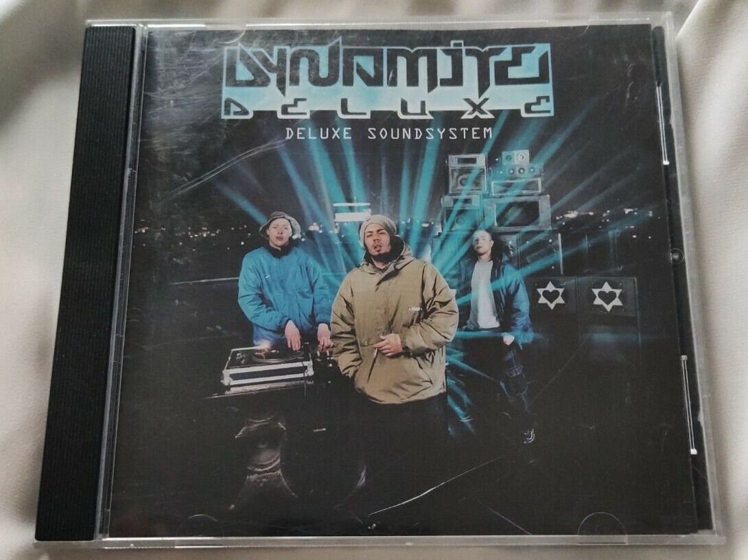 CDs: Dynamite Deluxe - Deluxe Soundsystem                  ©2000 – Gebraucht aus St. Gallen von elk2021