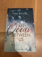 AN OCEAN BETWEEN US von Nina Bilinszki
