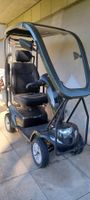 Elektromobil mit Dach und Zusatzfläche für Rollator usw.