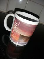 Mug Titanic L'Exposition céramique blanc très bon état.