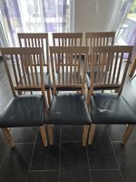 6 chaises en bois assises similicuir noir usées