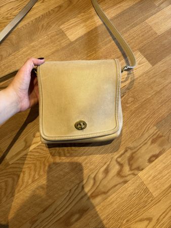 Vinatge Coach in einem schönen beige.