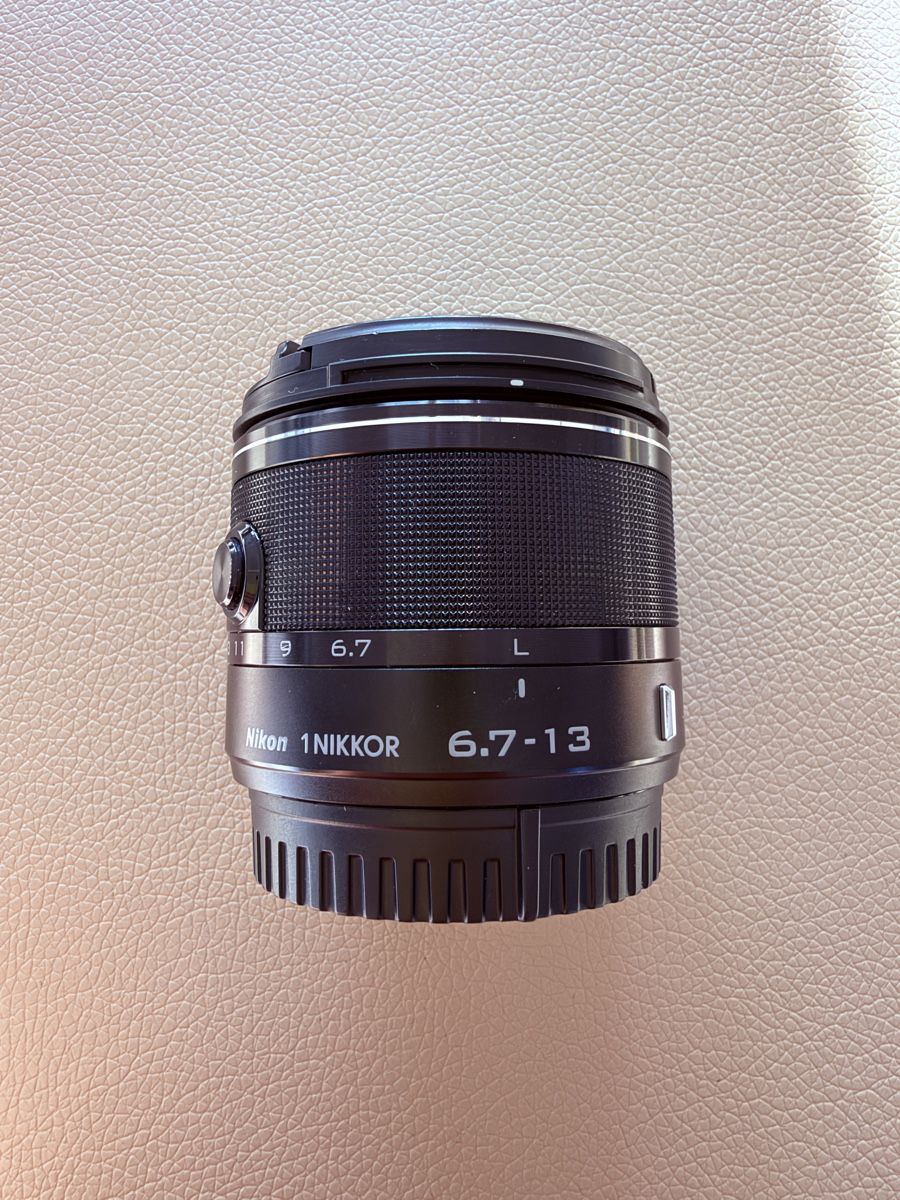 Nikon Objektive: Nikon 1 6.7-13mm Objektiv – Gebraucht aus Winterthur von R2D_Y7C