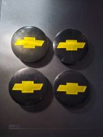 Chevrolet 65mm schwarze Radkappen 3B7 601 171