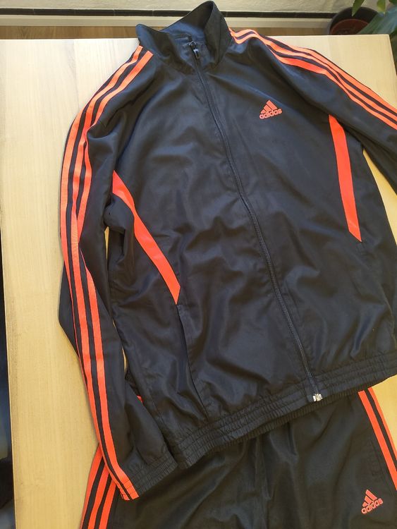 Adidas trainingsanzug schwarz orange online