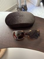 Lunettes de soleil Calvin Klein marron, parfaites pour l'été