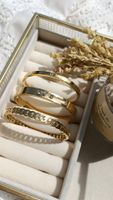 Lot de 3 bracelets dorés en acier de haute qualité neuf