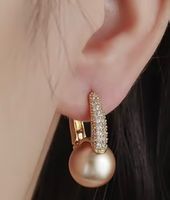 Jolies boucles d’oreilles plaquées/ brillants et perles