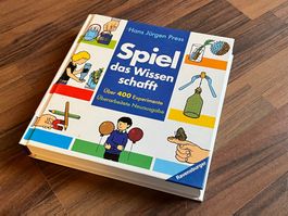 Buch *Spiel das Wissen schafft* mit über 400 Experimenten!