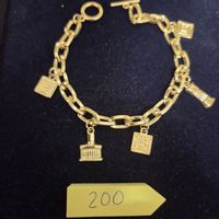 Vintage Silberfarbenes Armband mit Anhängern