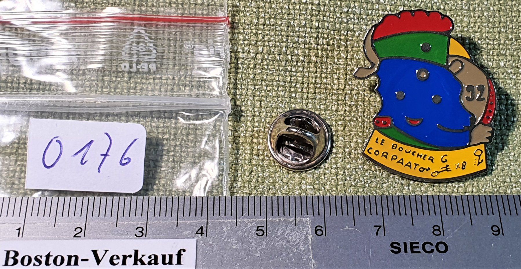 Placchette & Badge: O176 - Pin Le Boucher Corpaato 1992 – Usato da Reinach BL venduto da Boston-Verkauf 2