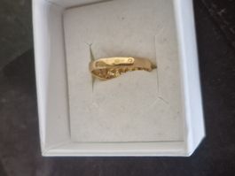 Belle bague en or avec pierres, 