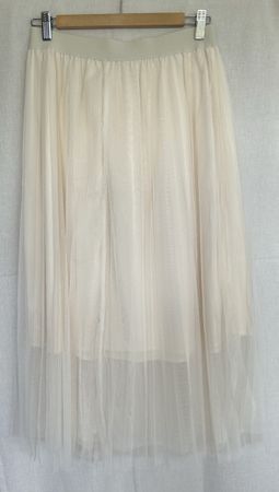 Jupe plissée, blanc cassé