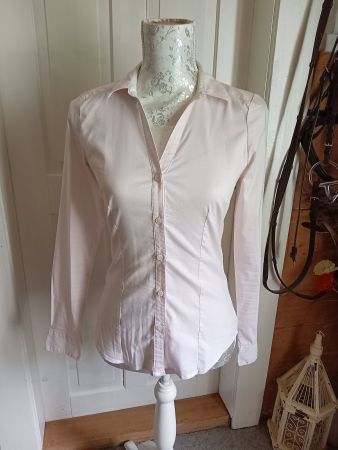 Chemise femme H&M rose clair taille 36 comme neuve.