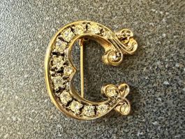 Vintage-Brosche mit Initiale C goldfarben mit Strass.
