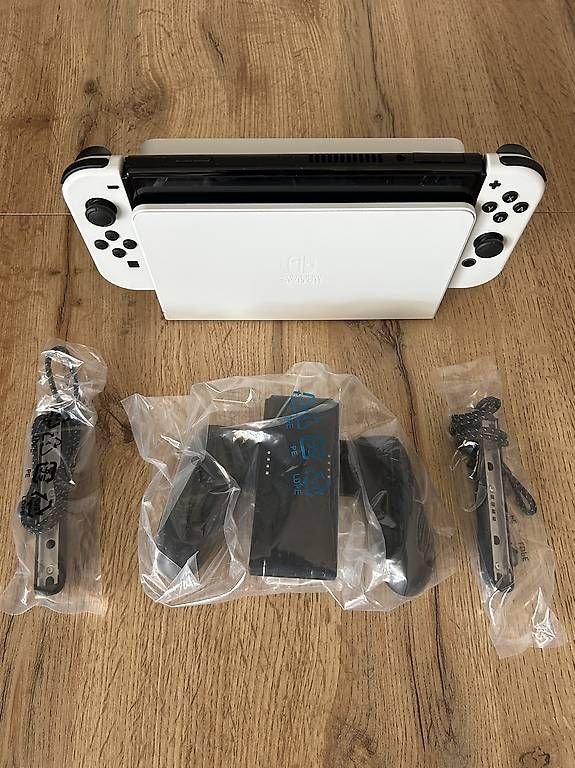 Nintendo Console: Nintendo Switch OLED Weiss, Garantie + Spiel – Nuovo (secondo la descrizione) da Arlesheim venduto da ram_lmj8 2
