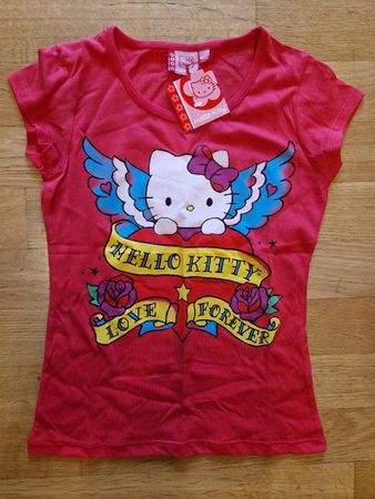 T-shirt Hello Kitty rouge taille 10 ans avec étiquette