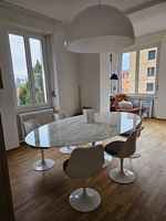 tavolo Knoll Tulip con 6 sedie girevoli