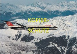 Flugzeug DC 9-81 der Swissair über den Schweizer Alpen /bc