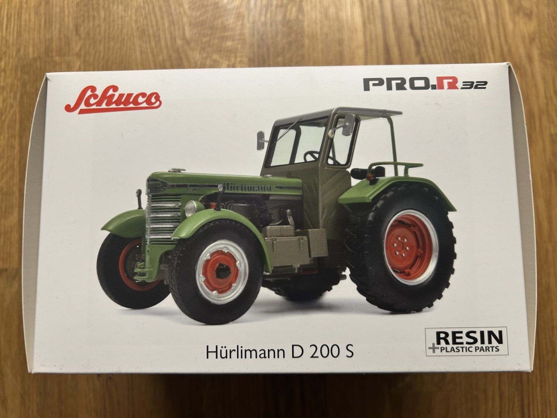 Schuco Kits de montage: Hürlimann D 200 S Traktor, – Neuf avec emballage d'origine à Basadingen par Gpf165