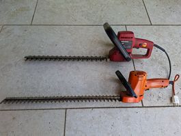 Zwei Heckenscheren. MioGarden. Black & Decker.
