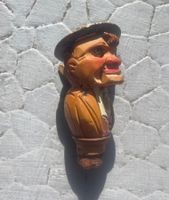 Bouchon sculpté à système