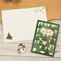 Filigrane Weihnachtskarte mit farbigem Umschlag