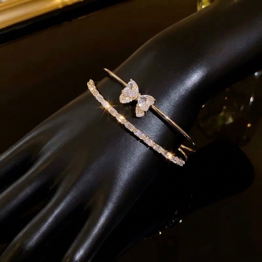 Bracciali & Braccialetti: Bracelet Jonc Doré avec Noeud Papillon – Nuovo e nell'imballaggio originale da St-Maurice venduto da Sandrinette123 2