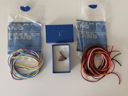 Pendentif Pierre Lang avec de nombreux cordons colorés