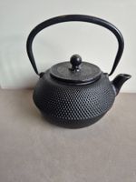 Théière en fonte noire C56