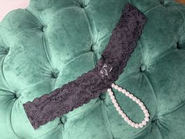 Schwarzes Spitzen String