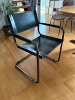 7 Echtlederstühle, Freischwinger, Schwarz mit Chrom