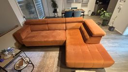 Ecksofa orange mit elektrischer Verstellung