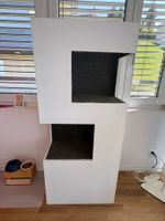 Lustiger Katzenbaum aus Holz und Stoff