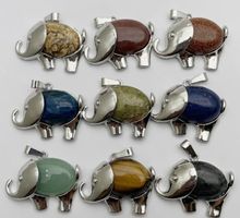 Pendentif elephant en pierre naturel.prix par piece