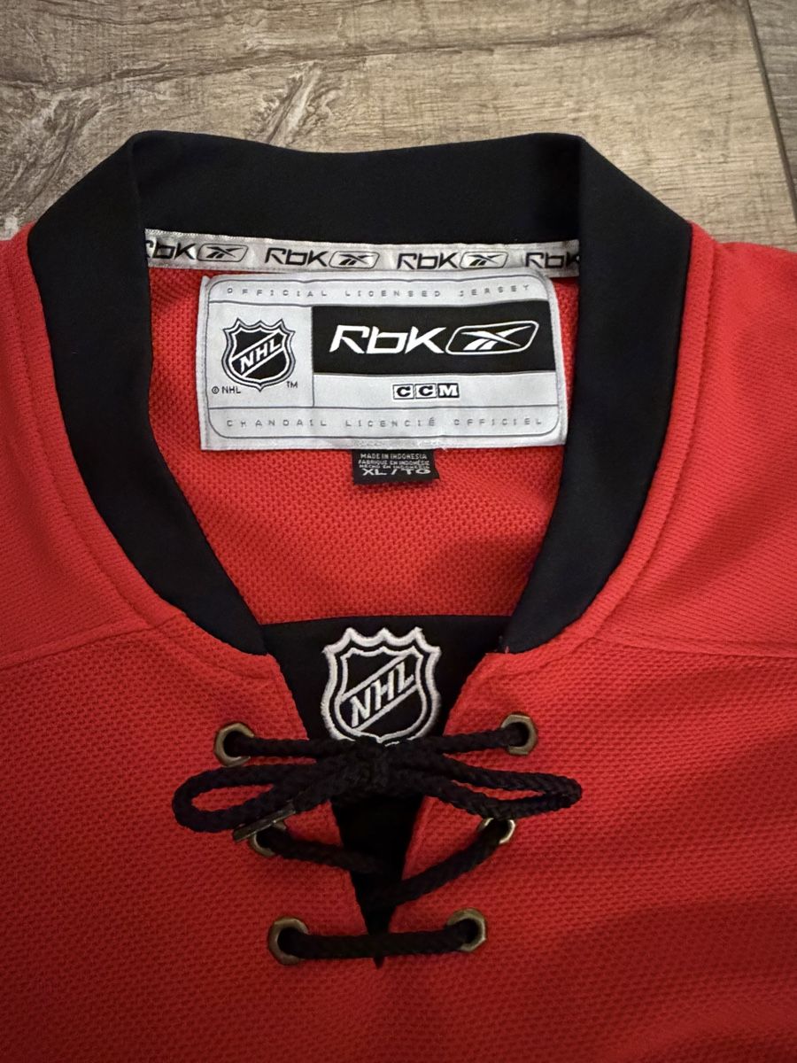 Leibchen & Hosen: NHL Calgary Flames Trikot – Gebraucht aus Winkel von Derschweizerseller 1