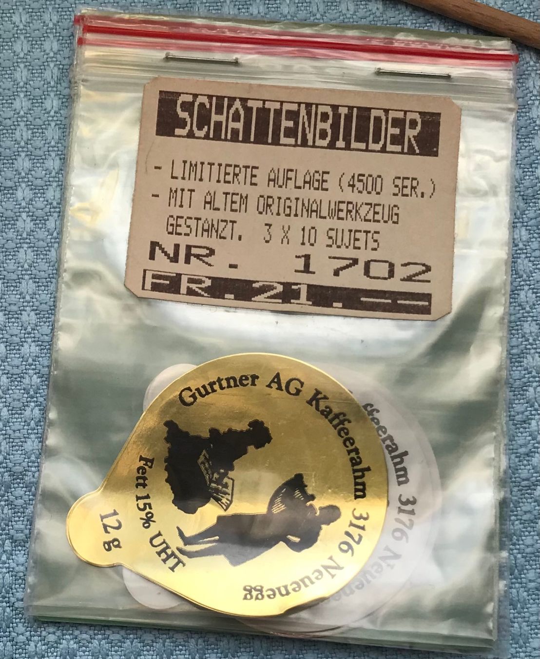 Coperchi dei cremini per caffè: Gurtner AG Kaffeerahm Deckel Schattenbilder – Nuovo e nell'imballaggio originale da Uznach venduto da Chrisanteme 1