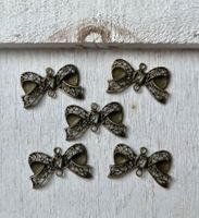 5 fiocchi in filigrana di ottone