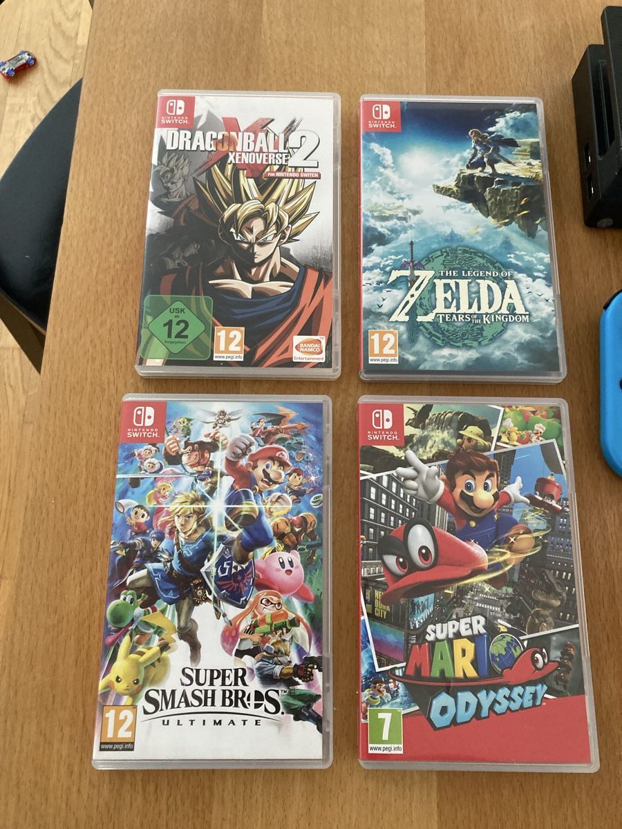 Nintendo Console: Nintendo Switch console with 4 games and some digital games – Usato da St. Gallen venduto da Parrotb 1