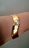 Bracelet jonc asymétrique rigide doré avec perle