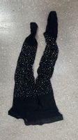 schwarze Netzstrümpfe mit Glitzersteinchen